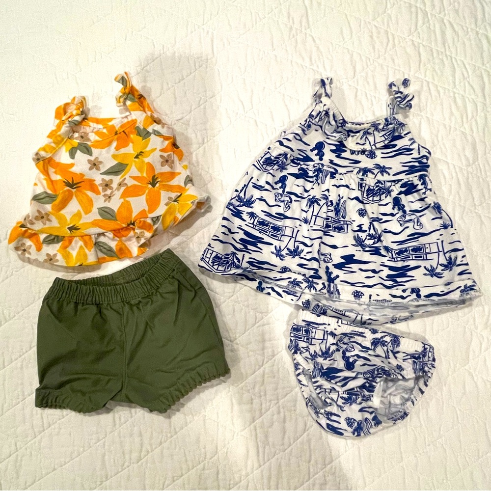 2 Carter’s Newborn Outfits